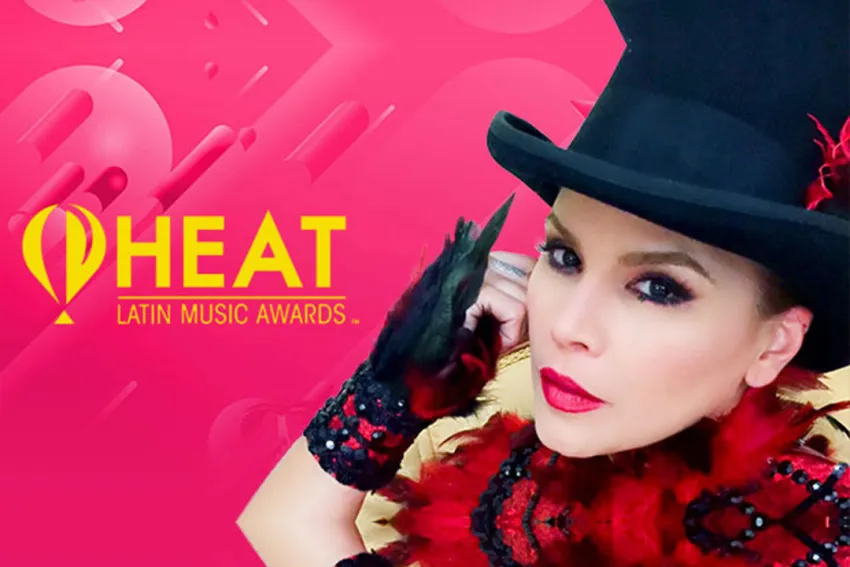 Olga Tañón con sombrero de copa