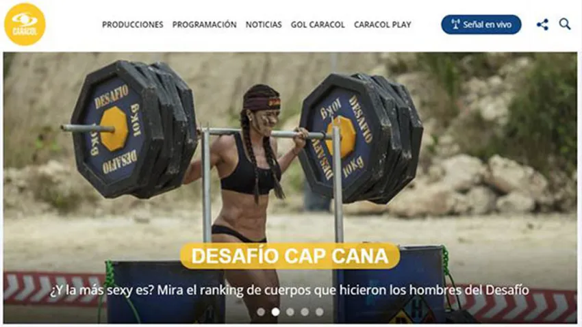 Tatiana Ussa Girardi cargando una barra llena de pesas sobre sus hombros en una competencia del Desafío Cap Cana de Caracol Televisión