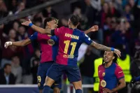 Yamal y Raphinha celebrando un gol