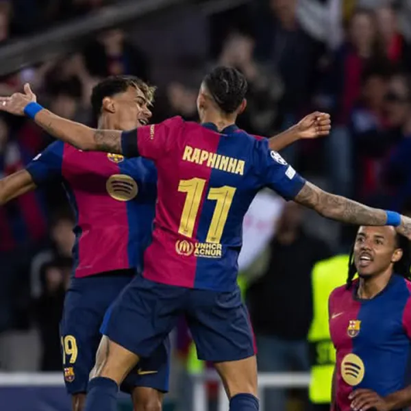 Yamal y Raphinha celebrando un gol