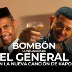 Kapo alzando una copa en señal de brindis por El General