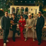 Luis Alfonso y Piso 21 junto a la modelo del video oficial de "Déjame Entrar"